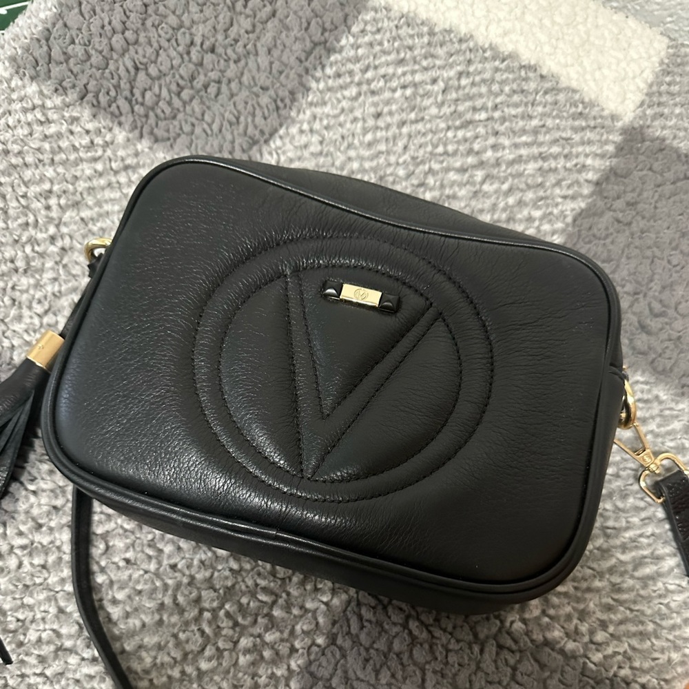 new with dust bag